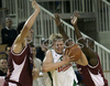 Teemu Rannikko (no.9) of Union Olimpija (M) going through defense of KK Bosna during NLB league match of 21. round between KK Union Olimpija, Ljubljana, Slovenia and KK Bosna Asa BH Telecom, Sarajevo, Bosnia and Hercegovina. Match ended with victory of Union Olimpija, who defeated KK Bosna ASA BTH with 93:68. Match between KK Union Olimpija and KK Bosna Asa BHT was played in Tivoli Arena in Ljubljana, Slovenia on 17. February 2007.
