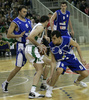 Ivica Jurkovic (no. 13) of Union Olimpija (M) between Miha Zalokar (no.6) of Helios Domzale (L) and Dario Krejic (no.8) of Helios Domzale (R) during match of 22nd round of Basketball NLB League between KK Union Olimpija, Ljubljana, Slovenia and Helios Domzale, Slovenia. Match ended with victory of Helios Domzale, who defeated Union Olimpija with 64:59. Match between KK Union Olimpija and Helios Domzale was played in Tivoli Arena in Ljubljana, Slovenia on 25. January 2007.
