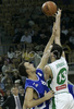 Ivica Jurkovic (no. 13) of Union Olimpija (R) shooting over Miha Zalokar (no.6) of Helios Domzale (L) during match of 22nd round of Basketball NLB League between KK Union Olimpija, Ljubljana, Slovenia and Helios Domzale, Slovenia. Match ended with victory of Helios Domzale, who defeated Union Olimpija with 64:59. Match between KK Union Olimpija and Helios Domzale was played in Tivoli Arena in Ljubljana, Slovenia on 25. January 2007.
