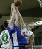Hasan Rizvic (no. 8) of Union Olimpija (L), Smiljan Pavic (no.9) of Helios Domzale (M), and Dejan Hohler (no. 10) of Union Olimpija (R) jumping for ball during match of 22nd round of Basketball NLB League between KK Union Olimpija, Ljubljana, Slovenia and Helios Domzale, Slovenia. Match ended with victory of Helios Domzale, who defeated Union Olimpija with 64:59. Match between KK Union Olimpija and Helios Domzale was played in Tivoli Arena in Ljubljana, Slovenia on 25. January 2007.

