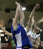 Hasan Rizvic (no. 8) of Union Olimpija (L), Smiljan Pavic (no.9) of Helios Domzale (M), and Dejan Hohler (no. 10) of Union Olimpija (R) jumping for ball during match of 22nd round of Basketball NLB League between KK Union Olimpija, Ljubljana, Slovenia and Helios Domzale, Slovenia. Match ended with victory of Helios Domzale, who defeated Union Olimpija with 64:59. Match between KK Union Olimpija and Helios Domzale was played in Tivoli Arena in Ljubljana, Slovenia on 25. January 2007.
