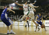 Dario Krejic (no.8) of Helios Domzale (R) fooling Goran Juran (no.4) of Union Olimpija (2nd from L) and Ivica Jurkovic (no. 13) of Union Olimpija (M), while Domen Zerak (no.13) of Helios Domzale (L) waiting for outcome during match of 22nd round of Basketball NLB League between KK Union Olimpija, Ljubljana, Slovenia and Helios Domzale, Slovenia. Match ended with victory of Helios Domzale, who defeated Union Olimpija with 64:59. Match between KK Union Olimpija and Helios Domzale was played in Tivoli Arena in Ljubljana, Slovenia on 25. January 2007.
