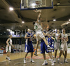 Manuchar Markoishvili (no. 11) of Union Olimpija (L) jumping for ball with Smiljan Pavic (no.9) of Helios Domzale (R) during match of 22nd round of Basketball NLB League between KK Union Olimpija, Ljubljana, Slovenia and Helios Domzale, Slovenia. Match ended with victory of Helios Domzale, who defeated Union Olimpija with 64:59. Match between KK Union Olimpija and Helios Domzale was played in Tivoli Arena in Ljubljana, Slovenia on 25. January 2007.
