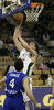 Goran Juran (no.4) of Union Olimpija (R) scoring over Sasa Doncic (no.4) of Helios Domzale (L) during match of 22nd round of Basketball NLB League between KK Union Olimpija, Ljubljana, Slovenia and Helios Domzale, Slovenia. Match ended with victory of Helios Domzale, who defeated Union Olimpija with 64:59. Match between KK Union Olimpija and Helios Domzale was played in Tivoli Arena in Ljubljana, Slovenia on 25. January 2007.
