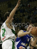 Jure Mocnik (no.14) of Helios Domzale (R) and   Goran Juran (no.4) of Union Olimpija (L) during match of 22nd round of Basketball NLB League between KK Union Olimpija, Ljubljana, Slovenia and Helios Domzale, Slovenia. Match ended with victory of Helios Domzale, who defeated Union Olimpija with 64:59. Match between KK Union Olimpija and Helios Domzale was played in Tivoli Arena in Ljubljana, Slovenia on 25. January 2007.
