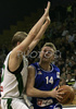 Jure Mocnik (no.14) of Helios Domzale (R) and Teemu Rannikko (no. 9) of Union Olimpija (L) during match of 22nd round of Basketball NLB League between KK Union Olimpija, Ljubljana, Slovenia and Helios Domzale, Slovenia. Match ended with victory of Helios Domzale, who defeated Union Olimpija with 64:59. Match between KK Union Olimpija and Helios Domzale was played in Tivoli Arena in Ljubljana, Slovenia on 25. January 2007.
