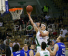Miha Zupan (no.24) of Union Olimpija scoring over players of Helios Domzale during match of 6th round of UPC Telemach Basketball League between KK Union Olimpija, Ljubljana, Slovenia and Helios Domzale, Slovenia. Match ended with victory of Helios Domzale, who defeated Union Olimpija with 82:87. Match between KK Union Olimpija and Helios Domzale was played in Tivoli Arena in Ljubljana, Slovenia on 14. April 2007.
