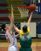 Bosko Stojakovic (no.5) of Zlatorog (R) scoring next to Gasper Vidmar (no.13) of Geoplin Slovan (L) during match of 12th round of Basketball UPC Telemach League for National champion between Geoplin Slovan, Ljubljana, Slovenia and Zlatorog Lasko, Slovenia. Match ended with victory of Zlatorog, who defeated Geoplin Slovan with 100:96. Match between Geoplin Slovan and Zlatorog was played in Kodeljevo hall in Ljubljana, Slovenia on 5th. May 2007.
