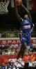 Tariq Kirksay (no.12) of France slam dunks during friendly match between Slovenia and France. Match ended with victory of France, who defeated Slovenia with 87:90. Match between Slovenia and France was played in Tabor Arena in Maribor, Slovenia on 25. August 2007.
