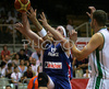 Frederic Weis (no.15) of France (M) between Radoslav Nesterovic (no.8) of Slovenia (R) and Goran Jagodnik (no.12) of Slovenia (L) during friendly match between Slovenia and France. Match ended with victory of France, who defeated Slovenia with 87:90. Match between Slovenia and France was played in Tabor Arena in Maribor, Slovenia on 25. August 2007.
