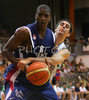 Yakhouba Diawara (no.8) of France (front) and Domen Lorbek (no.13) of Slovenia (back) fighting for ball during friendly match between Slovenia and France. Match ended with victory of France, who defeated Slovenia with 87:90. Match between Slovenia and France was played in Tabor Arena in Maribor, Slovenia on 25. August 2007.
