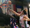 Florent Pietrus (no.11) of France (L) trying to score, while Matjaz Smodis (no.9) of Slovenia (R) is trying to block him from behind during friendly match between Slovenia and France. Match ended with victory of France, who defeated Slovenia with 87:90. Match between Slovenia and France was played in Tabor Arena in Maribor, Slovenia on 25. August 2007.
