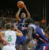 Tony Parker (no.9) of France (M) scoring over Jaka Lakovic (no.5) of Slovenia (L) during friendly match between Slovenia and France. Match ended with victory of France, who defeated Slovenia with 87:90. Match between Slovenia and France was played in Tabor Arena in Maribor, Slovenia on 25. August 2007.
