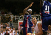 Matjaz Smodis (no.9) of Slovenia (M) trying to score between Tariq Kirksay (no.12) of France (L) and Florent Pietrus (no.11) of France (R) during friendly match between Slovenia and France. Match ended with victory of France, who defeated Slovenia with 87:90. Match between Slovenia and France was played in Tabor Arena in Maribor, Slovenia on 25. August 2007.
