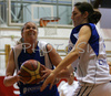 Niina Laaksonen of Finland (L) attacking during match of additional qualification round for Women Basketball European Championships between Slovenia and Finland. Match ended with victory of Slovenia, who defeated Finland with 72:56. Match between Slovenia and Finland was played in Slovenske Konjice, Slovenia on 5. September 2007.
