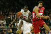 Ronell Taylor (no.30) of Union Olimpija (L) and Georgios Printezis (no.16) of Olympiacos (R) jumping for ball during match of 2nd round of Basketball Euroleague between Union Olimpija, Ljubljana, Slovenia and Olympiacos, Piraeus, Greece. Match ended with victory of Union Olimpija, who defeated Olympiacos with 87:78. Match between KK Union Olimpija and Olympiacos was played in Tivoli Arena in Ljubljana, Slovenia on 1. November 2007.
