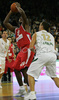Marc Jackson (no.25) of Olympiacos (L) trying to score over Marko Milic (no.12) of Union Olimpija (R) during match of 2nd round of Basketball Euroleague between Union Olimpija, Ljubljana, Slovenia and Olympiacos, Piraeus, Greece. Match ended with victory of Union Olimpija, who defeated Olympiacos with 87:78. Match between KK Union Olimpija and Olympiacos was played in Tivoli Arena in Ljubljana, Slovenia on 1. November 2007.
