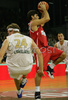 Emmanouil Papamakarios (no.5) of Olympiacos (R) against Miha Zupan (no.24) of Union Olimpija (L) during match of 2nd round of Basketball Euroleague between Union Olimpija, Ljubljana, Slovenia and Olympiacos, Piraeus, Greece. Match ended with victory of Union Olimpija, who defeated Olympiacos with 87:78. Match between KK Union Olimpija and Olympiacos was played in Tivoli Arena in Ljubljana, Slovenia on 1. November 2007.
