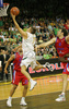 Jan Mocnik (no.7) of Union Olimpija scoring during match of 3nd round of Basketball Euroleague between Union Olimpija, Ljubljana, Slovenia and CSKA Moscow, Russia. Match ended with victory of Union Olimpija, who defeated CSKA Moscow with 74:72. Match between KK Union Olimpija and CSKA was played in Tivoli Arena in Ljubljana, Slovenia on 7. November 2007.
