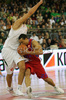 Trajan Langdon (no.21) of CSKA Moscow (R) attacking while Hasan Rizvic (no.1) of Union Olimpija (L) is trying to block him during match of 3nd round of Basketball Euroleague between Union Olimpija, Ljubljana, Slovenia and CSKA Moscow, Russia. Match ended with victory of Union Olimpija, who defeated CSKA Moscow with 74:72. Match between KK Union Olimpija and CSKA was played in Tivoli Arena in Ljubljana, Slovenia on 7. November 2007.
