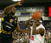 Ronell Taylor (no.30) of Union Olimpija (R) and Dajuan Wagner (no.9) of Prokom Trefl (L) during match of 7th round of Basketball Euroleague between Union Olimpija, Ljubljana, Slovenia and Prokom Trefl Sopot, Sopot, Poland. Match ended with victory of Union Olimpija, who defeated Prokom Trefl with 68:49. Match between KK Union Olimpija and Prokom Trefl was played in Tivoli Arena in Ljubljana, Slovenia on 6. December 2007.
