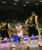 Sasa Doncic (no.4) of Union Olimpija (M) attacking between Jovo Stanojevic (no.12) of Prokom Trefl (L), Milan Gurovic (no.15) of Prokom Trefl (2nd from L) and Filip Dylewicz (no.8) of Prokom Trefl (R) during match of 7th round of Basketball Euroleague between Union Olimpija, Ljubljana, Slovenia and Prokom Trefl Sopot, Sopot, Poland. Match ended with victory of Union Olimpija, who defeated Prokom Trefl with 68:49. Match between KK Union Olimpija and Prokom Trefl was played in Tivoli Arena in Ljubljana, Slovenia on 6. December 2007.
