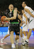 Rimantas Kaukenas (no.13) of Montepaschi Siena (L) trying to score while Jasmin Hukic (no.13) of Union Olimpija (R) is trying to block him during match of 8th round of Basketball Euroleague between Union Olimpija, Ljubljana, Slovenia and Montepaschi Siena, Italy. Match between KK Union Olimpija and Montepaschi Siena was played in Tivoli Arena in Ljubljana, Slovenia on 13. December 2007.
