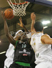 Romain Sato (no.10) of Montepaschi Siena (M) in fight with Jasmin Hukic (no.13) of Union Olimpija (R) and Ronell Taylor (no.30) of Union Olimpija (L) during match of 8th round of Basketball Euroleague between Union Olimpija, Ljubljana, Slovenia and Montepaschi Siena, Italy. Match between KK Union Olimpija and Montepaschi Siena was played in Tivoli Arena in Ljubljana, Slovenia on 13. December 2007.
