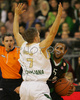 Terrell Mcintryre (no.5) of Montepaschi Siena (R) and Jan Mocnik (no.7) of Union Olimpija (L) during match of 8th round of Basketball Euroleague between Union Olimpija, Ljubljana, Slovenia and Montepaschi Siena, Italy. Match between KK Union Olimpija and Montepaschi Siena was played in Tivoli Arena in Ljubljana, Slovenia on 13. December 2007.
