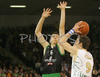Goran Dragic (no.9) of Union Olimpija (R) scoring next to Vlado Ilievski (no.6) of Montepaschi Siena (L) during match of 8th round of Basketball Euroleague between Union Olimpija, Ljubljana, Slovenia and Montepaschi Siena, Italy. Match between KK Union Olimpija and Montepaschi Siena was played in Tivoli Arena in Ljubljana, Slovenia on 13. December 2007.

