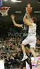 Goran Dragic (no.9) of Union Olimpija (R) scoring next to Vlado Ilievski (no.6) of Montepaschi Siena (L) during match of 8th round of Basketball Euroleague between Union Olimpija, Ljubljana, Slovenia and Montepaschi Siena, Italy. Match between KK Union Olimpija and Montepaschi Siena was played in Tivoli Arena in Ljubljana, Slovenia on 13. December 2007.
