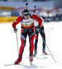 Ivan Maric of Slovenia leaving shooting place after second shooting during sprint race of Biathlon World Cup on Pokljuka, Slovenia. Biathlon Ruhrgas World Cup was held on Pokljuka, Slovenia between 16. and 20.February 2005. Biathletes were competing on Wednesday in 10km sprint race which was won by Alexandre Syman of Belarus, Sergei Roshkov of Russia placed second while Andreas Birnbacher of Germany finished third. <br> 
