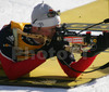 Ferreol Cannard of France during prone shooting in men sprint race of e.on Ruhrgas IBU Biathlon World cup which was held on Pokljuka, Slovenia on 8.March 2006.

