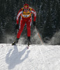 Tomasz Sikora of Poland skiing during men sprint race of e.on Ruhrgas IBU Biathlon World cup which was held on Pokljuka, Slovenia on 8.March 2006.
