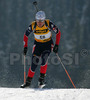 Florence Baverel-Robert of France skiing during women sprint race of e.on Ruhrgas IBU Biathlon World cup which was held on Pokljuka, Slovenia on 9.March 2006.
