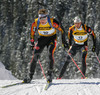 Andreas Birnbacher of Germany (front) and Alexander Wolf of Germany (back) skiing during men pursuit race of e.on Ruhrgas IBU Biathlon World cup which was held on Pokljuka, Slovenia on 11.March 2006.

