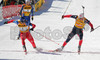 Winner Ole Einar Bjoerndalen of Norway (M), second placed Raphael Poiree of France (R) and third placed Carl Johan Bergman of Sweden (L) sprinting for victory during men pursuit race of e.on Ruhrgas IBU Biathlon World cup which was held on Pokljuka, Slovenia on 11.March 2006.
