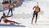 Winner Ole Einar Bjoerndalen of Norway (M), second placed Raphael Poiree of France (R) and third placed Carl Johan Bergman of Sweden (L) sprinting for victory during men pursuit race of e.on Ruhrgas IBU Biathlon World cup which was held on Pokljuka, Slovenia on 11.March 2006.
