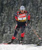 Florence Baverel-Robert of France skiing during women pursuit race of e.on Ruhrgas IBU Biathlon World cup which was held on Pokljuka, Slovenia on 11.March 2006.
