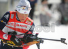 Florence Baverel-Robert of France getting ready for standing shooting during women pursuit race of e.on Ruhrgas IBU Biathlon World cup which was held on Pokljuka, Slovenia on 11.March 2006.
