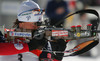 Florence Baverel-Robert of France shooting during women pursuit race of e.on Ruhrgas IBU Biathlon World cup which was held on Pokljuka, Slovenia on 11.March 2006.
