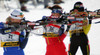 Kaisa Makarainen of Finland (L), Jori Moerkve of Norway (M) and Marcela Pavkovcekova of Slovakia (R) shooting during women pursuit race of e.on Ruhrgas IBU Biathlon World cup which was held on Pokljuka, Slovenia on 11.March 2006.
