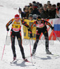 Second placed Kati Wilhelm of Germany (L) and third placed Katrin Apel of Germany (R) skiing during women pursuit race of e.on Ruhrgas IBU Biathlon World cup which was held on Pokljuka, Slovenia on 11.March 2006.
