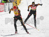 Second placed Kati Wilhelm of Germany (L) and third placed Katrin Apel of Germany sprinting to finish line of during women pursuit race of e.on Ruhrgas IBU Biathlon World cup which was held on Pokljuka, Slovenia on 11.March 2006.
