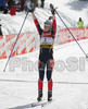 Winner Sandrine Bailly of France celebrating her victory when skiing to finish of women pursuit race of e.on Ruhrgas IBU Biathlon World cup which was held on Pokljuka, Slovenia on 11.March 2006.
