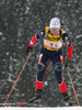 Florence Baverel-Robert of France skiing during mixed relay race of IBU Biathlon World Championship which was held on Pokljuka, Slovenia on 12.March 2006. Race was won by relay of Russia, relay of Norway placed second, while relay of France finished third.
