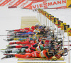 Biathletes shooting during mixed relay race of IBU Biathlon World Championship which was held on Pokljuka, Slovenia on 12.March 2006. Race was won by relay of Russia, relay of Norway placed second, while relay of France finished third.
