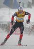 Vincent Defrasne of France skiing during mixed relay race of IBU Biathlon World Championship which was held on Pokljuka, Slovenia on 12.March 2006. Race was won by relay of Russia, relay of Norway placed second, while relay of France finished third.
