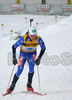 Timo Antila of Finland leaving shooting place after final shooting during mixed relay race of IBU Biathlon World Championship which was held on Pokljuka, Slovenia on 12.March 2006. Race was won by relay of Russia, relay of Norway placed second, while relay of France finished third.
