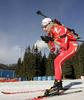 Florence Baverel-Robert of France skiing in women pursuit race on Pokljuka, Slovenia. IBU Biathlon World Cup sprint race was held on Pokljuka, Slovenia on 19th of January 2007.
